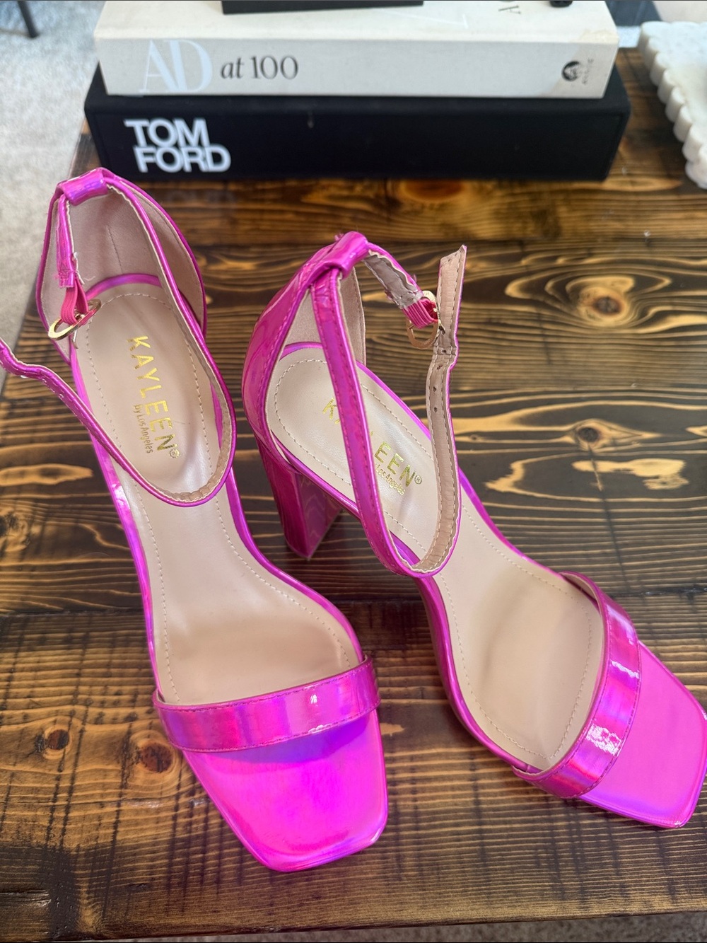 Kayleen brand ankle strap heels in a vibrant fuchsia patent leather finish.